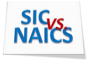 Image text reads "SIC vs. NAICS" in blue and red letters on a white background.